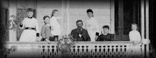 Photo of Robert Kennedy family on the verandah of their home.